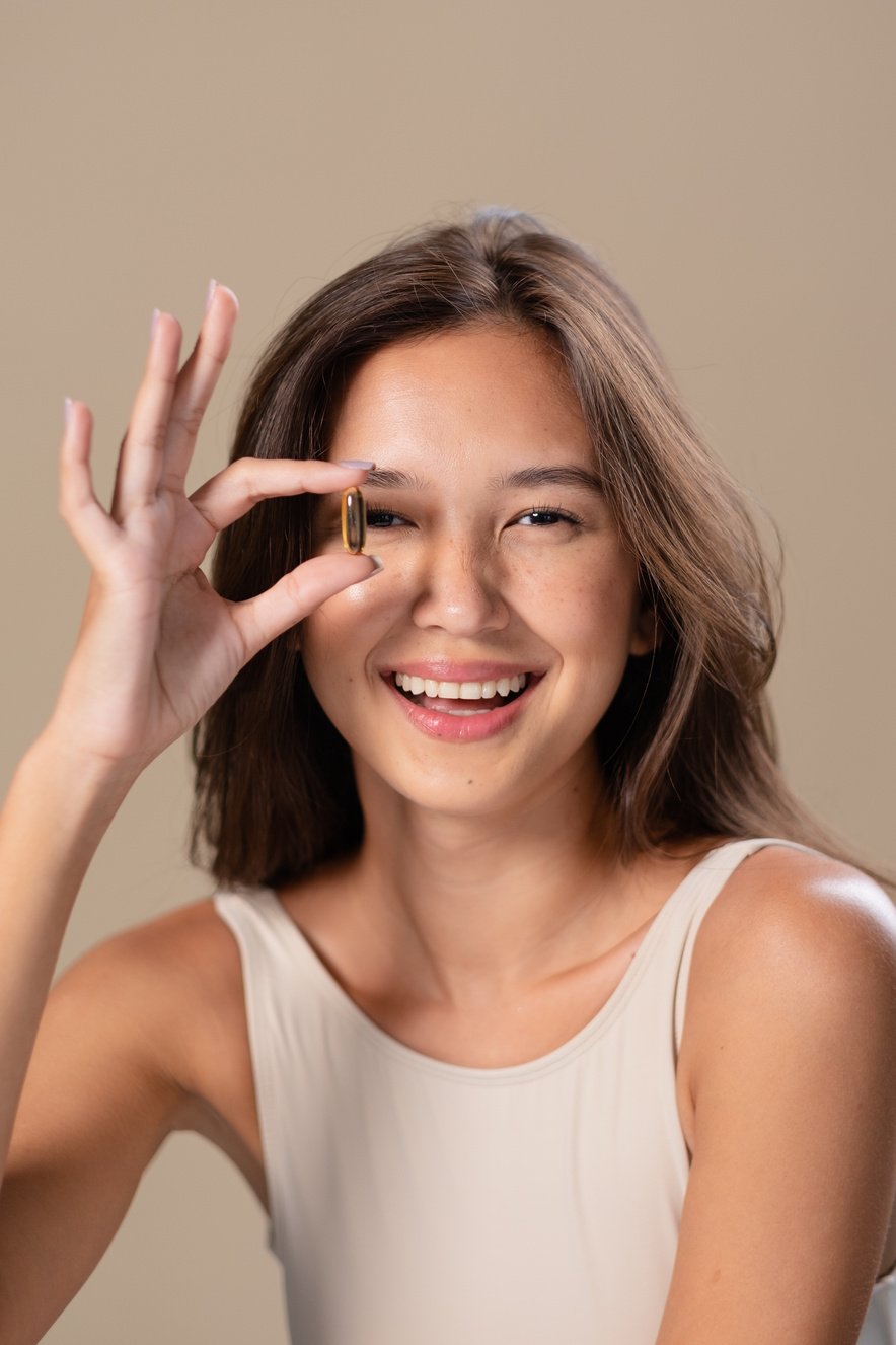 Portrait of Woman with Capsule Supplement